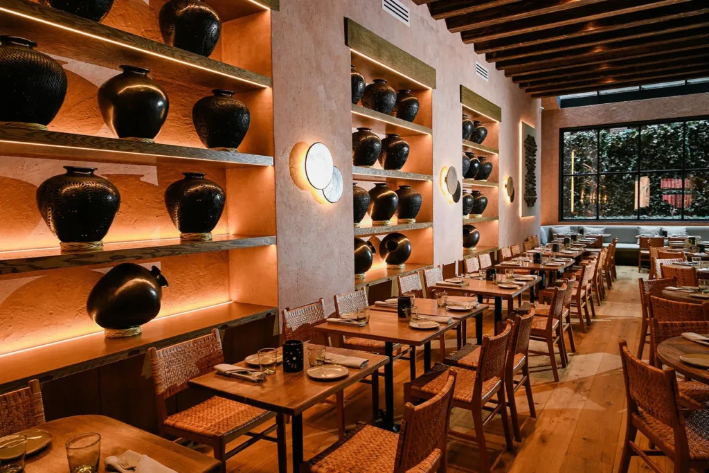 Latin restaurant dining area with wooden tables